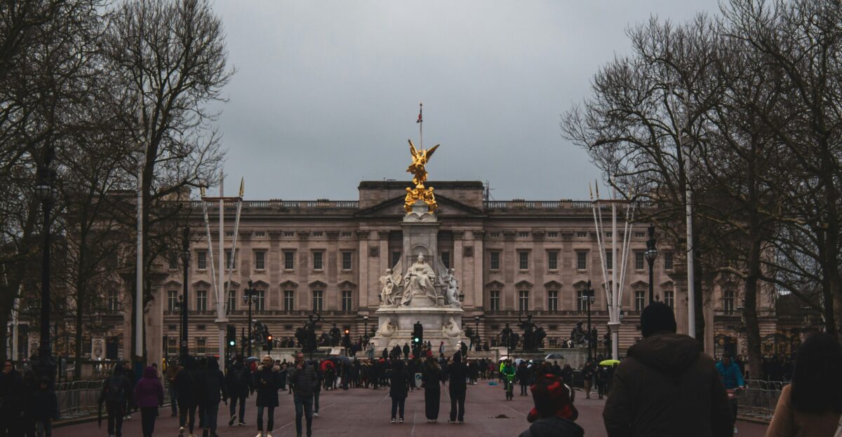 a group of people standing in front of a building