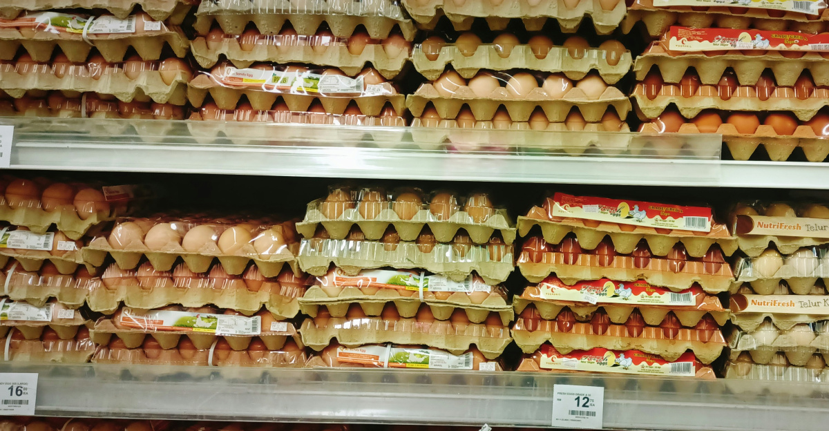 a display in a grocery store filled with lots of eggs