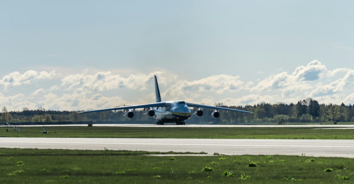 a large jetliner taking off from an airport runway