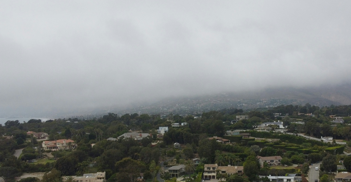 A bird's eye view of a city on a cloudy day