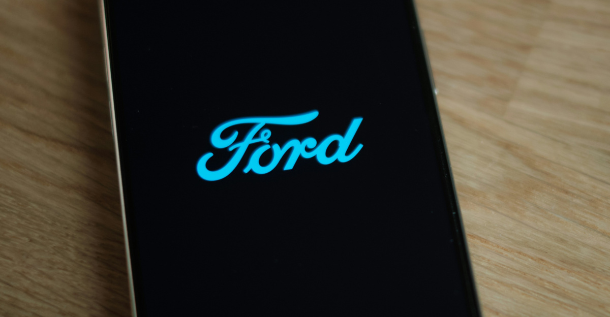 A cell phone sitting on top of a wooden table