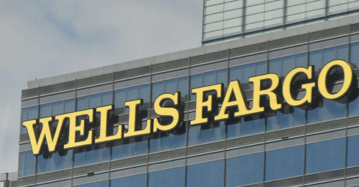 A tall building with a wells fargo sign on top