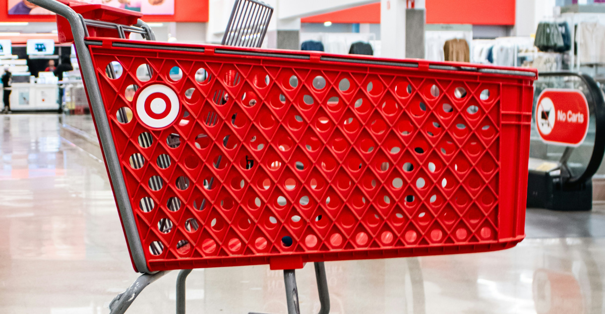 Red target shopping cart inside a store.