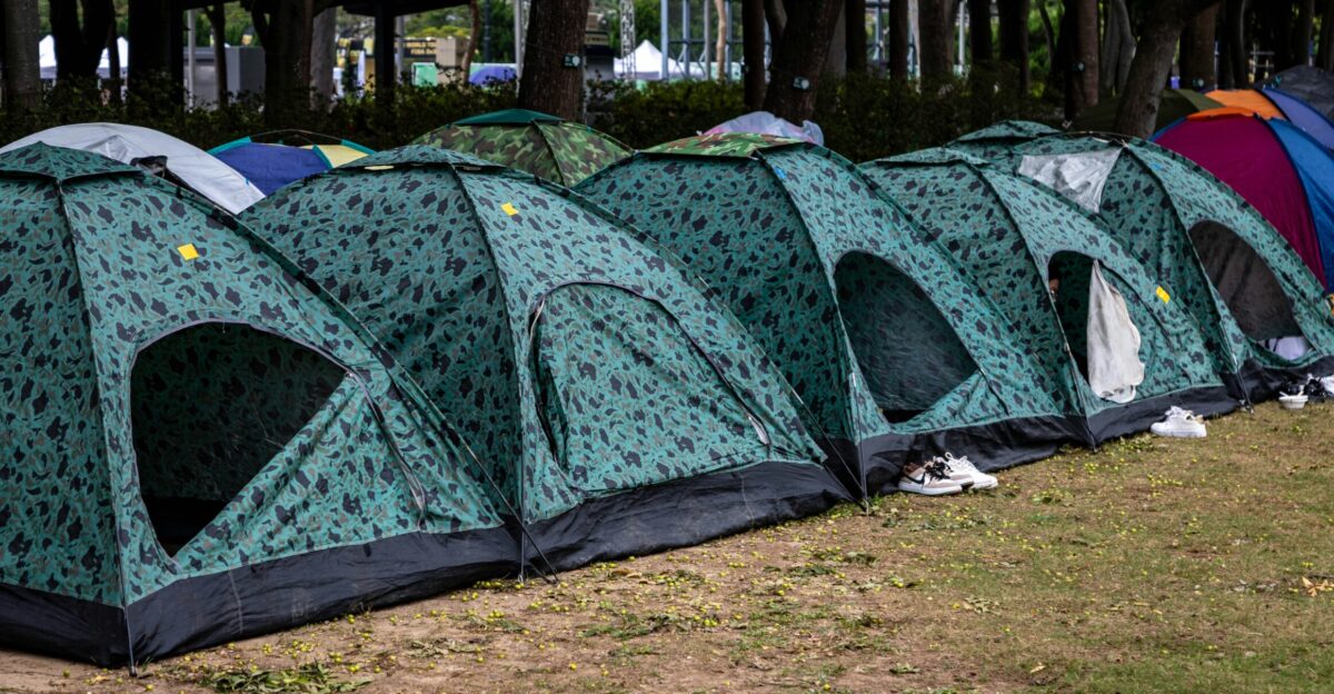 Camping tents are lined up in a row