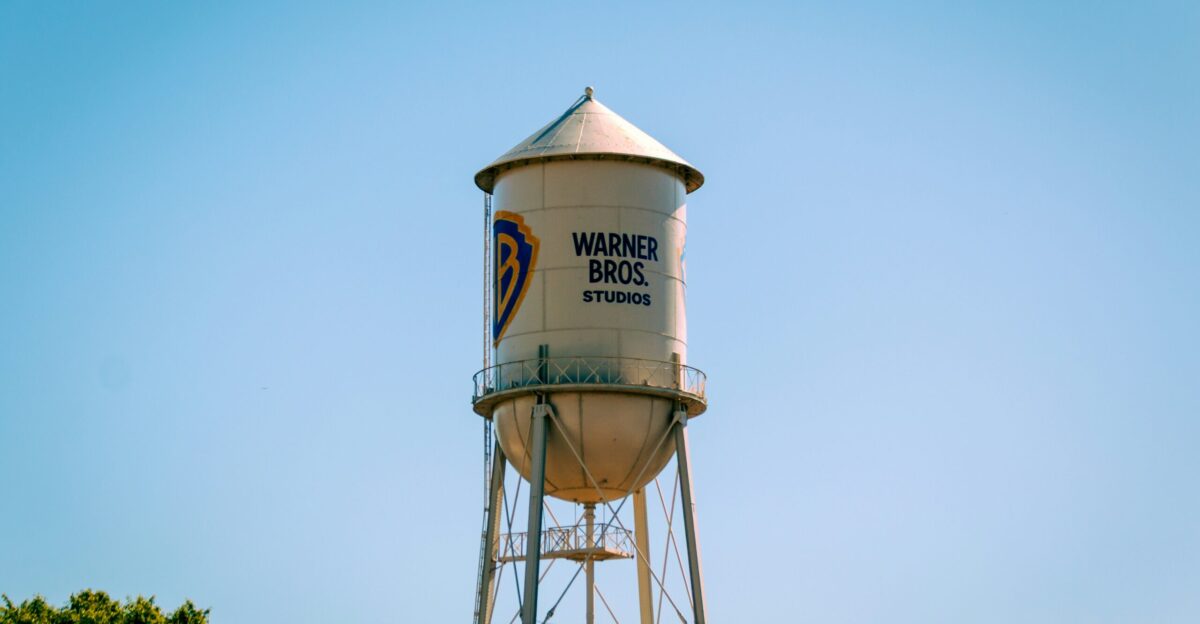 The warner bros water tower against a blue sky