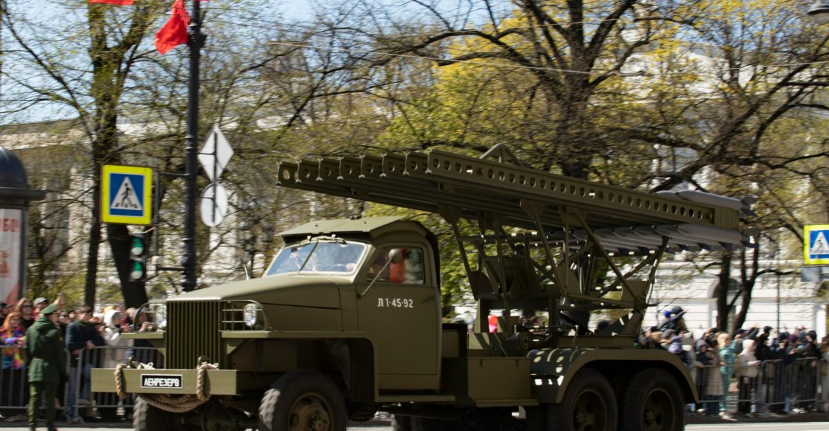 A russian military vehicle parades in the street
