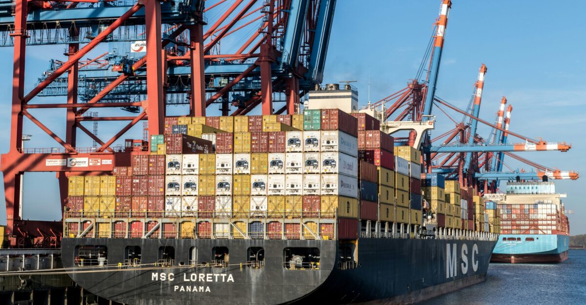 A cargo ship loaded with containers at the dock