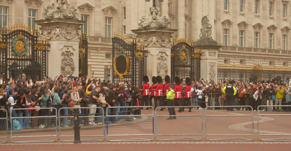 Buckingham palace guards and crowds at ceremony