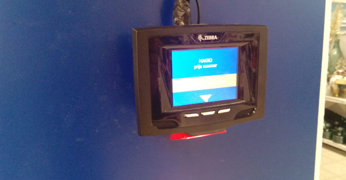 A price scanner for finding out the prices of products that is located inside of a large local Makro-branded store that is located in the Haaglander city of Delft South Holland