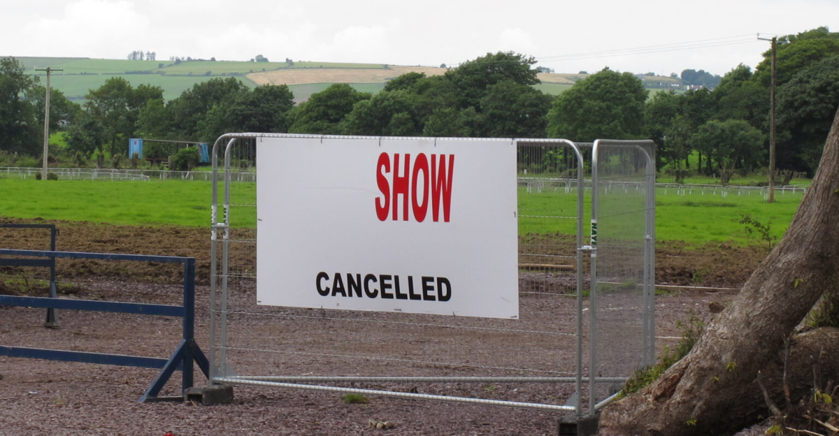 "Show cancelled" sign at Curraheen <span class="mw-valign-text-top" typeof="mw:File/Frameless"><a href="//commons.wikimedia.org/wiki/File:%22Show_cancelled%22_sign_at_Curraheen_-_geograph.org.uk_-_3095574.jpg#ooui-php-4" title="Edit this at Structured Data on Commons"><img decoding=