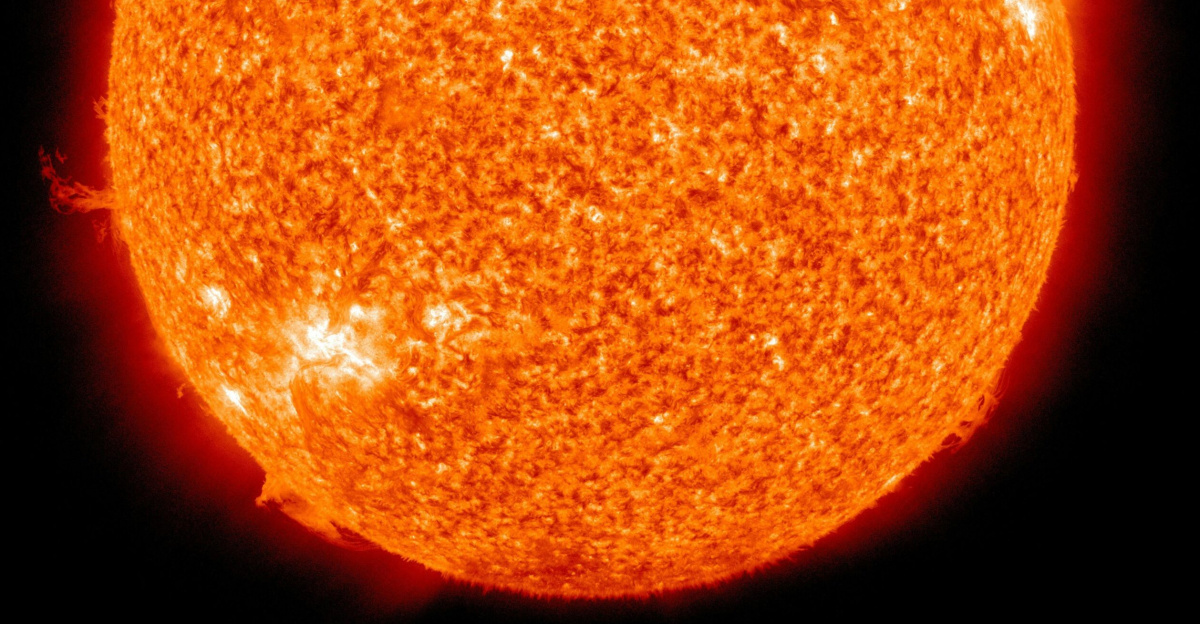 Detailed image of the sun showcasing its fiery surface and glowing edges.