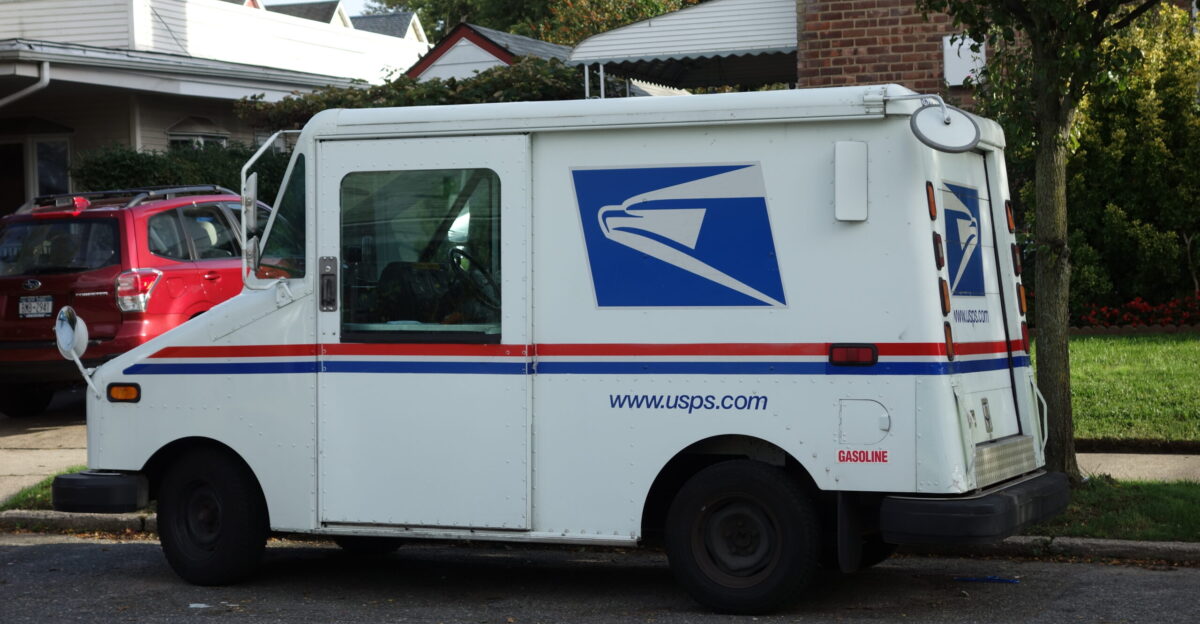 One of the smaller suburban Grumman delivery trucks of the USPS parked at 81st Avenue and 169th Street in Hillcrest Queens These are becoming more common in the city well at least in this part of the city