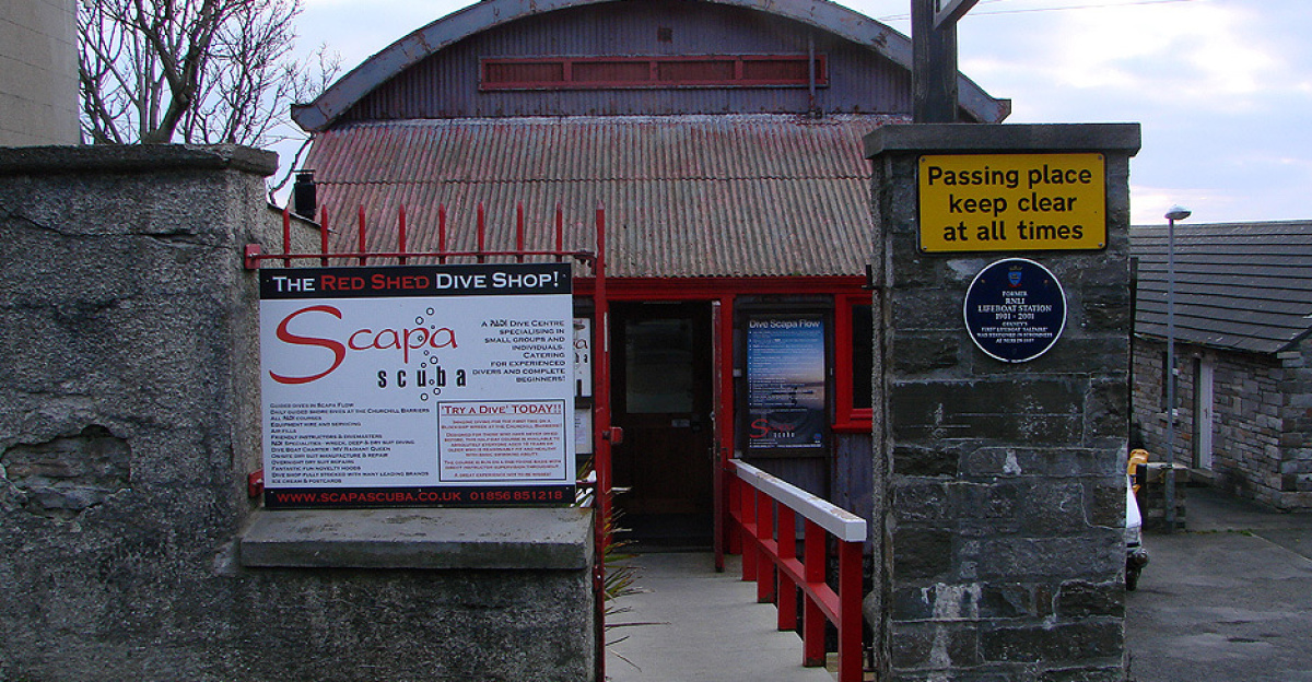 'The Red Shed Dive Shop' <span class="mw-valign-text-top" typeof="mw:File/Frameless"><a href="//commons.wikimedia.org/wiki/File:%27The_Red_Shed_Dive_Shop%27_-_geograph.org.uk_-_6545227.jpg#ooui-php-4" title="Edit this at Structured Data on Commons"><img decoding=
