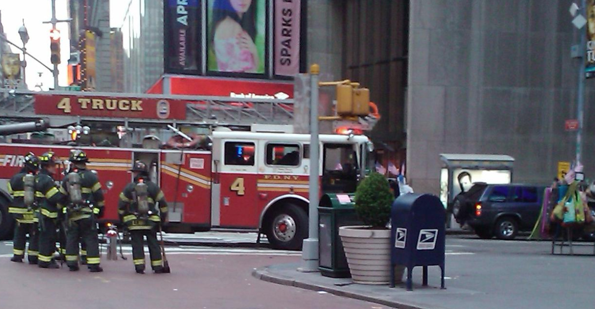 Crop of <a href="//commons.wikimedia.org/wiki/File:Times_sq_2010_05_01_18.55.jpg" title="File:Times sq 2010 05 01 18.55.jpg">File:Times sq 2010 05 01 18.55.jpg</a> a snapshot taken at 6:55, 2010-05-01, of the suspected car bomb in Times Square, Manhattan. Taken right in front of the Marriott, looking south. Press says the attempted attack took place at 6:38. My family visiting from out of town strolled in ~6:45, fire and police began blocking off area ~ 6:50, with no explanation. The suspect suv is blue/black, on the right, with hazards on.