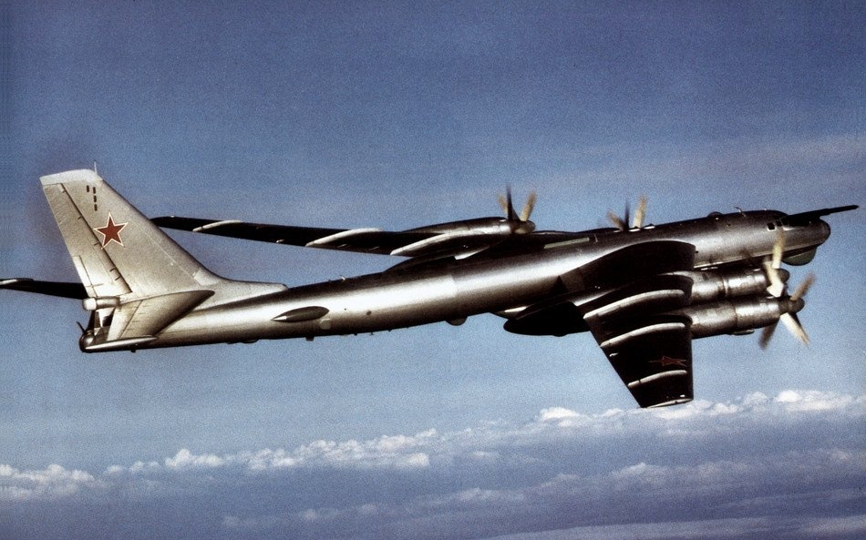 A Soviet Tupolev Tu-95 NATO reporting code Bear in 1984 The photo was taken froma U S Navy aircraft of Carrier Air Wing 2 CVW-2 CVW-2 was assigned to the aircraft carrier USS Kitty Hawk CV-63 for a deployment to the Western Pacific and the Indian Ocean from 13 January to 1 August 1984