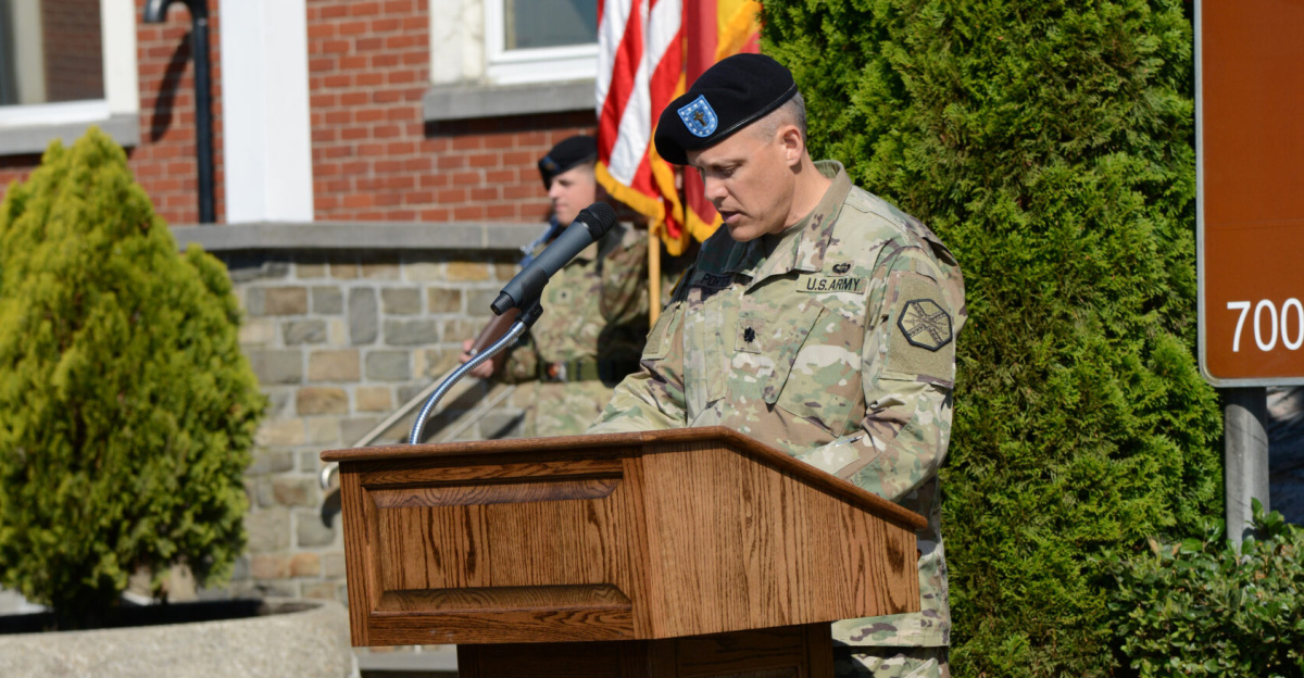 U.S. Army Lt. Col. Kelly D. Porter, garrison chaplain, makes the invocation during the U.S. Army Garrison Benelux Change of Command on Caserne Daumerie in Chièvres, Belgium, June 29, 2018. (U.S. Army photo by Visual Information Specialist Henri Cambier)