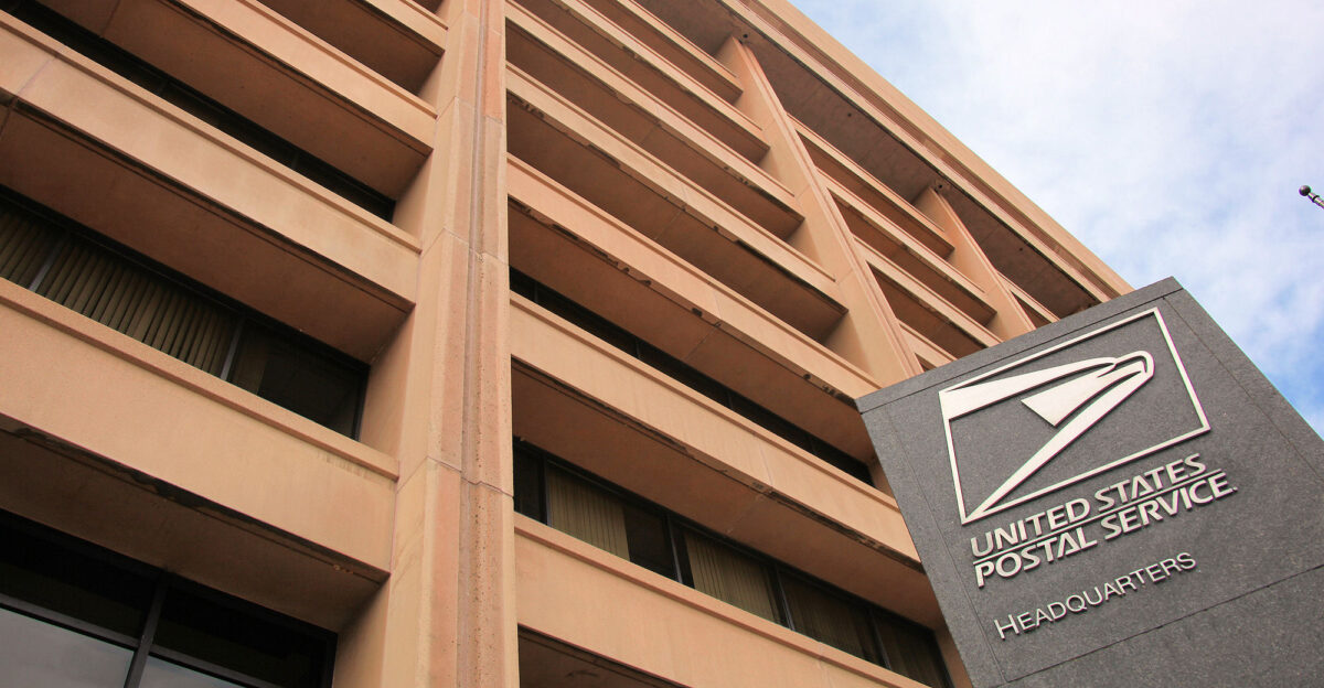 Signage and east facade to the United States Postal Service Headquarters Building formerly known as the L Enfant Plaza West Building on L Enfant Promenade SW in Washington D C in the United States The building was designed by Vlastimil Koubek Former First Lady Mamie Eisenhower and developer William Zeckendorf broke ground for the structure in February 1969 At 640 000 square feet 59 000 m2 it was the largest private office building at the time in Washington D C