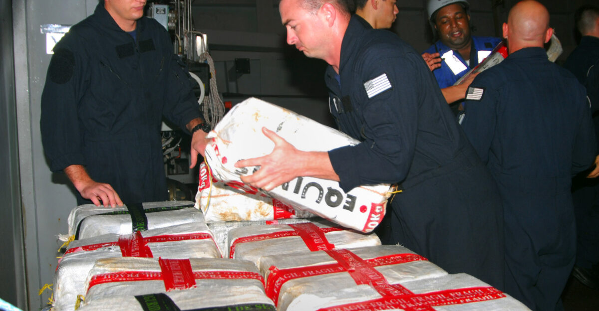 CARIBBEAN SEA March 12 2010 Sailors and Coast Guardsmen from the littoral combat ship USS Freedom LCS 1 stack bales of cocaine dumped overboard by a small boat intercepted by Freedom during counter-illicit trafficking operations in the U S 4th Fleet area of responsibility Freedom recovered two tons of cocaine from the southern Caribbean Sea U S Navy photo by Lt Ed Early Released