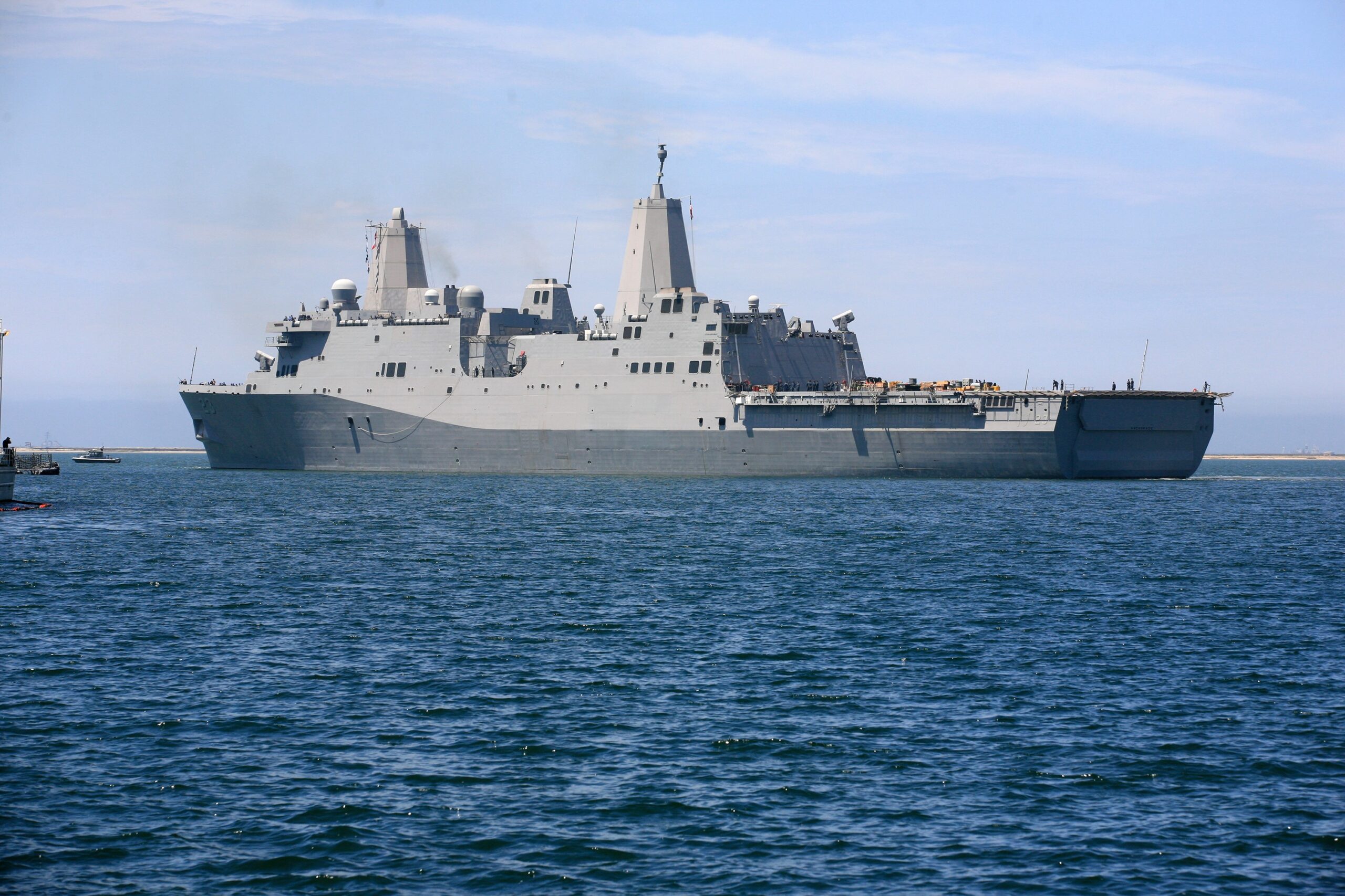 At the U S Naval Base San Diego in California the USS Anchorage is being prepared for the Orion Underway Recovery Test 2 The Orion boilerplate test vehicle and other hardware will be loaded into the well deck of the ship and head out to sea in the Pacific Ocean off the coast of San Diego NASA Lockheed Martin and the U S Navy will conduct the test to prepare for recovery of the Orion crew module forward bay cover and parachutes on its return from a deep space mission The underway recovery test will allow the teams to demonstrate and evaluate the recovery processes procedures new support hardware and personnel in open waters The Ground Systems Development and Operations Program will conduct the underway recovery tests Orion is the exploration spacecraft designed to carry astronauts to destinations not yet explored by humans including an asteroid and Mars It will have emergency abort capability sustain the crew during space travel and provide safe re-entry from deep space return velocities The first unpiloted test flight of the Orion is scheduled to launch in 2014 atop a Delta IV rocket and in 2017 on NASA s Space Launch System rocket