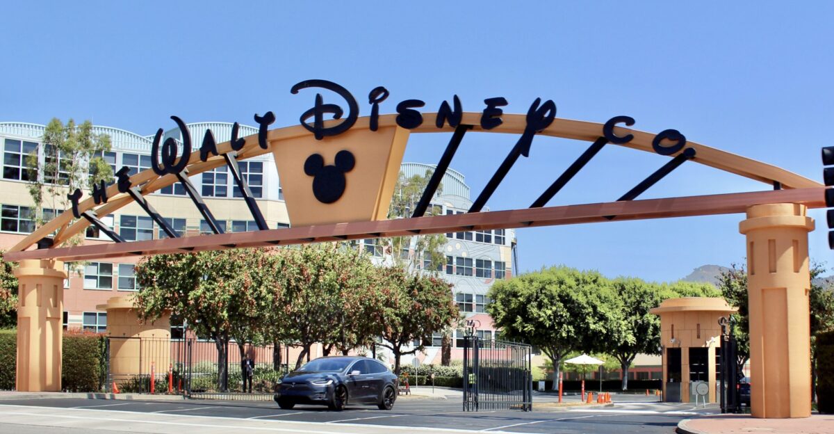 The Alameda Avenue entrance to the Walt Disney Studios in Burbank California This was taken just after a major renovation in summer 2016 in which the dated tropical pastels of the gateway arch were replaced with a more conservative orange-and-black color scheme and Mickey Mouse was added to the arch Photographed on July 11 2016 by user Coolcaesar