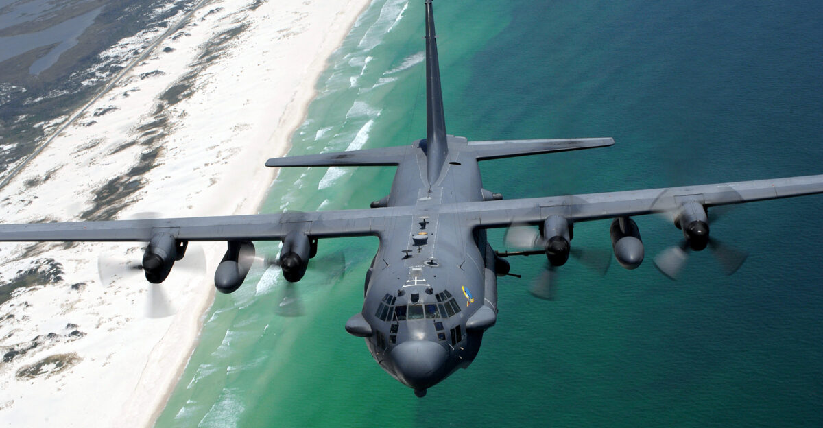 An AC-130H gunship from the 16th Special Operations Squadron flies over the Destin Florida coastline on Aug 24 2007 during multi-gunship formation egress training