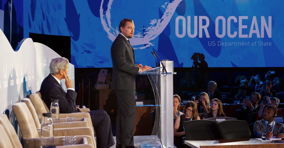 U S Secretary of State John Kerry watches actor and environmentalist Leonardo DiCaprio on September 15 2016 as he addressed the third Our Ocean Conference at the U S Department of State in Washington D C State Department Photo Public Domain