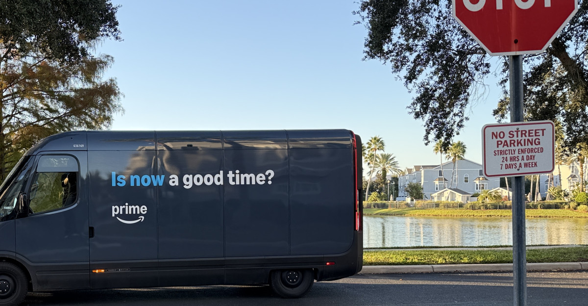 An Amazon electric delivery van manufactured by Rivian is seen at a gated townhome neighborhood in Orlando Florida