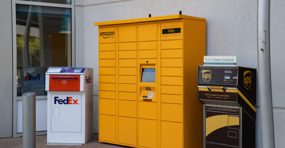 An Amazon parcel delivery locker system in Phoenix Arizona next to a FedEx and UPS drop box