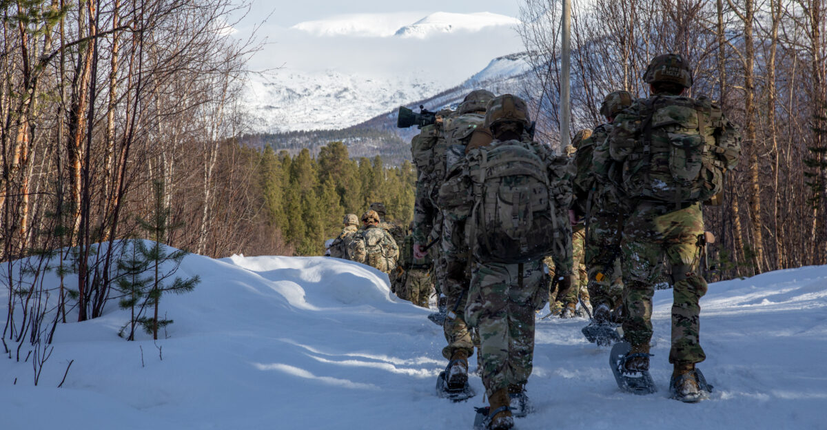 U S Soldiers with Commanche Company 1st Battalion 501st Parachute Infantry Regiment 2nd Infantry Brigade Combat Team Airborne 11th Airborne Division trek through the snow during Arctic Shock 24 in Overbygd Norway March 19 2024 The Norwegians and Americans exchanged tactics techniques and procedures during Arctic Shock a combined U S and Norwegian exercise demonstrating interoperability with Arctic partners and capabilities in the harsh environment U S Army Photo by Sgt Avery Cunningham
