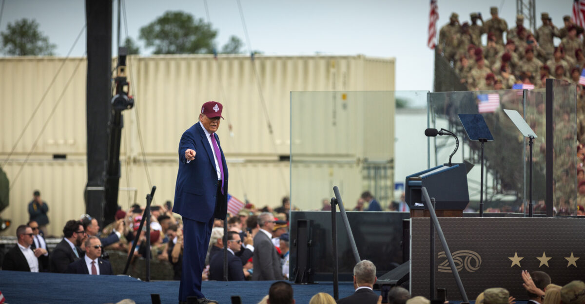 President Donald J Trump points toward the audience while addressing troops and guests during the Army s 250th birthday celebration at Fort Bragg North Carolina June 10 2025 His gesture energized the crowd as he spoke directly to Soldiers encouraging their continued service and dedication U S Army photo by Staff Sgt Rene Rosas