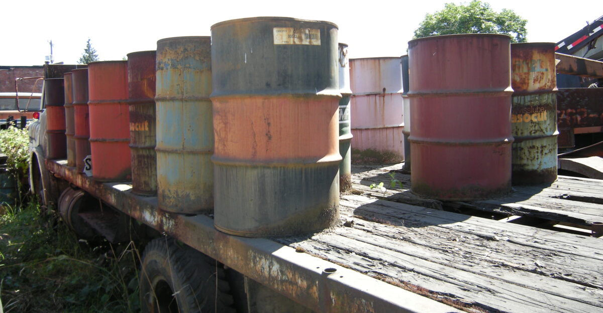 Barrels left over from vehicle lube photographed at All Metal Co Georgetown Seattle Washington