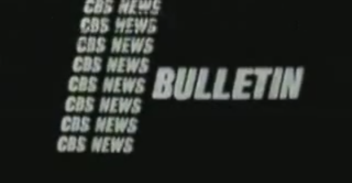Walter Cronkite is vividly remembered by many Americans for breaking the news of the death of President Kennedy on Friday November 22 1963 Cronkite had been standing at the United Press International wire machine in the CBS newsroom as the bulletin of the President s shooting broke and clamored to get on the air to break the news However cameras were not ready for use and Cronkite would be forced to break the news without them while one warmed up At 1 40 p m a CBS News Bulletin bumper slide broke into the live broadcast of As the World Turns ATWT Over the slide Cronkite began reading Here is a bulletin from CBS News In Dallas Texas three shots were fired at President Kennedy s motorcade in downtown Dallas The first reports say that President Kennedy has been seriously wounded by this shooting