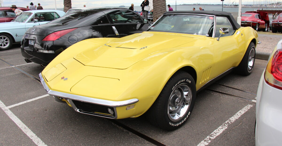 Safari Yellow The 3rd generation Corvette was built from 1968-82 Running gear was carried over from the previous generation The C3 design was based on the Mako Shark II concept car it was longer narrower and lower than the C2 it was the 1st Corvette to offer a T top and removable rear window 1968 was the only year that used a push-button door lock below the door handle it got 4 vertical slots in the front fenders and even tho it was still a Corvette Stingray there were no badges to say so in 1968 In 1969 the 350 replaced the 327 Stingray script appeared on front fenders now one word Finger plate door release would actuate the door eliminating the separate release button as in 68 The only year for the 430hp ZL1 option aluminium 427 1968 Engines 300 or 350 hp 327 cu in 390 400 or 435hp 427 cu in V8s With the optional big block engine came a revised hood with a raised center section and integral air exhaust vents
