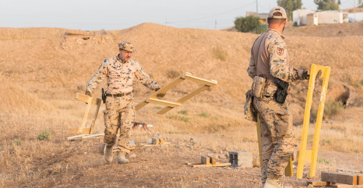 Coalition Forces set up targets to prepare for range operations at Beneslawa Range in Erbil, Iraq, July 4, 2025. Coalition Forces train warfighting skills to maintain lethality and enable regional security and stability. (U.S. Army photo by Master Sgt. Ray Boyington)