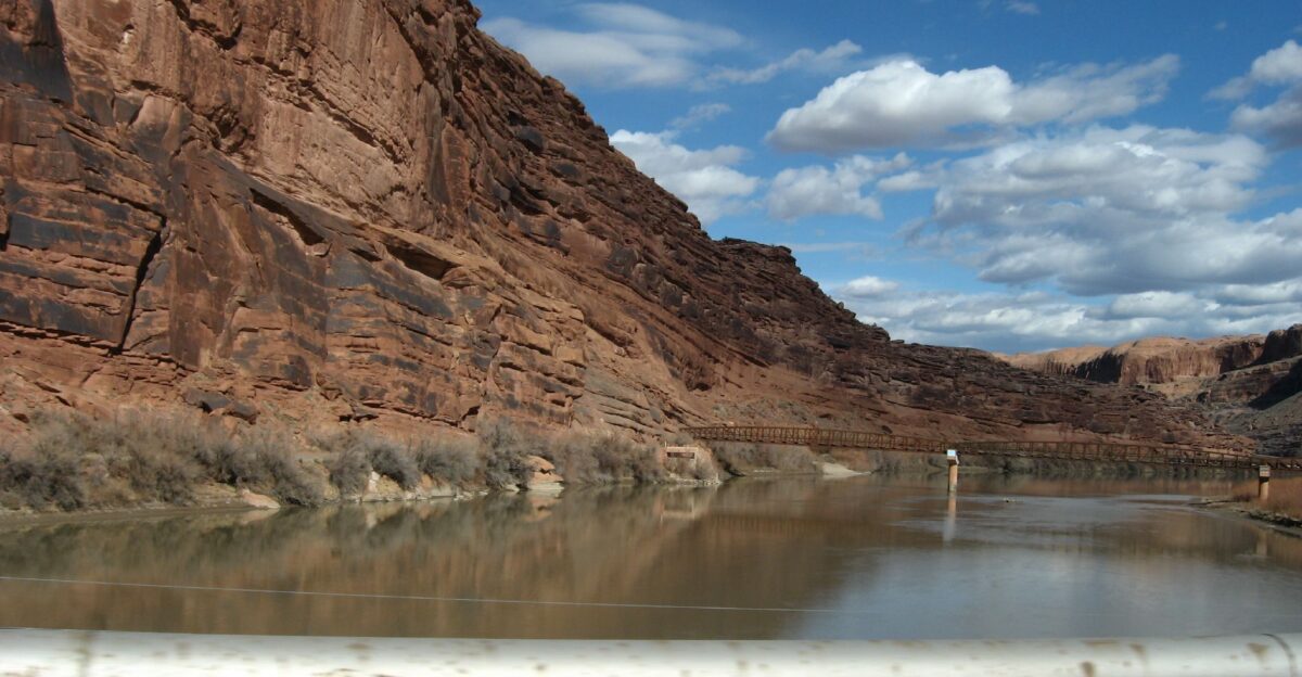 The Colorado River is the principal river of the Southwestern United States and northwest Mexico The 1 450-mile 2 330 km river drains an expansive arid watershed that encompasses parts of seven U S and two Mexican states Rising in the central Rocky Mountains in the U S the river flows generally southwest across the Colorado Plateau and through the Grand Canyon before reaching Lake Mead on the Arizona-Nevada line where it turns south toward the international border After entering Mexico the Colorado approaches the large Colorado River Delta where it naturally emptied into the Gulf of California between Baja California and Sonora though it no longer reaches its delta or the sea Known for its dramatic canyons and whitewater rapids the Colorado is a vital source of water for agricultural and urban areas in the southwestern desert lands of North America The river and its tributaries are controlled by an extensive system of dams reservoirs and aqueducts which divert 90 of its water in the U S alone to furnish irrigation and municipal water supply for almost 40 million people both inside and outside the watershed The Colorado s large flow and steep gradient are used for generating hydroelectric power and its major dams regulate peaking power demands in much of the Intermountain West Since the mid-20th century intensive water consumption has dried the lower 100 miles 160 km of the river such that it has not consistently reached the sea since the 1960s Europeans first entered the Colorado Basin in the 16th century when explorers from Spain began mapping and claiming the area which later became part of Mexico upon its independence in 1821 Early contact between foreigners and natives was generally limited to the fur trade in the headwaters and sporadic trade interactions along the lower river After the greater Colorado River basin became part of the U S in 1846 the bulk of the river s course was still largely the subject of myths and speculation Several expeditions charted the Colorado in the mid-19th century one of which led by John Wesley Powell in 1869 was the first to run the rapids of the Grand Canyon American explorers collected valuable information that would later be used to develop the river for navigation and water supply Large-scale settlement of the lower basin began in the mid- to late-19th century with steamboats providing transportation from the Gulf of California to landings along the Colorado River that linked to wagon roads into the interior of New Mexico Territory Lesser numbers settled in the upper basin which was the scene of major gold strikes in Arizona and Nevada in the 1860s and 1870s Major engineering of the river basin began around the start of the 20th century with many guidelines established in a series of domestic and international treaties known as the Law of the River The U S federal government was the main driving force behind the construction of hydraulic engineering projects in the river system although many state and local water agencies were also involved Most of the major dams in the river basin were built between 1910 and 1970 and the system keystone Hoover Dam was completed in 1935 The Colorado is now considered among the most controlled and litigated rivers in the world with every drop of its water fully allocated The damming and diversion of the Colorado River system have been flashpoint issues for the environmental movement in the American Southwest because of their impacts on the ecology and natural beauty of the river and its tributaries During the construction of Glen Canyon Dam environmental organizations vowed to block any further development of the river and a number of later dam and aqueduct proposals were defeated by citizen opposition As demands for Colorado River water continue to rise the level of human development and control of the river continues to generate controversy en wikipedia org wiki Colorado River en wikipedia org wiki Wikipedia Text of Creative Commons