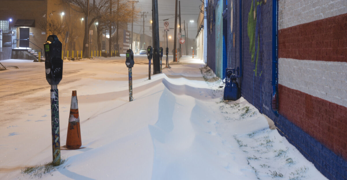 Deep Ellum sidewalk covered with snow in Dallas snow storm 2021