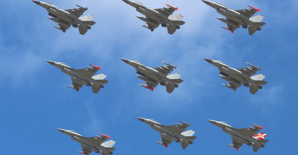 A diamond formation of nine General Dynamics F-16 Fighting Falcon aircraft from Squadrons 727 and 730 Fighter Wing Skrydstrup Royal Danish Air Force on a display flight at Danish Air Show 2014 At the time the photograph was taken there were 30 operational F-16s in Denmark The configuration of the individual aircraft varies but includes 370GL Conformal fuel tanks Litening G4 targeting pod Modular Reconnaissance Pod MRP manufactured by Terma A S