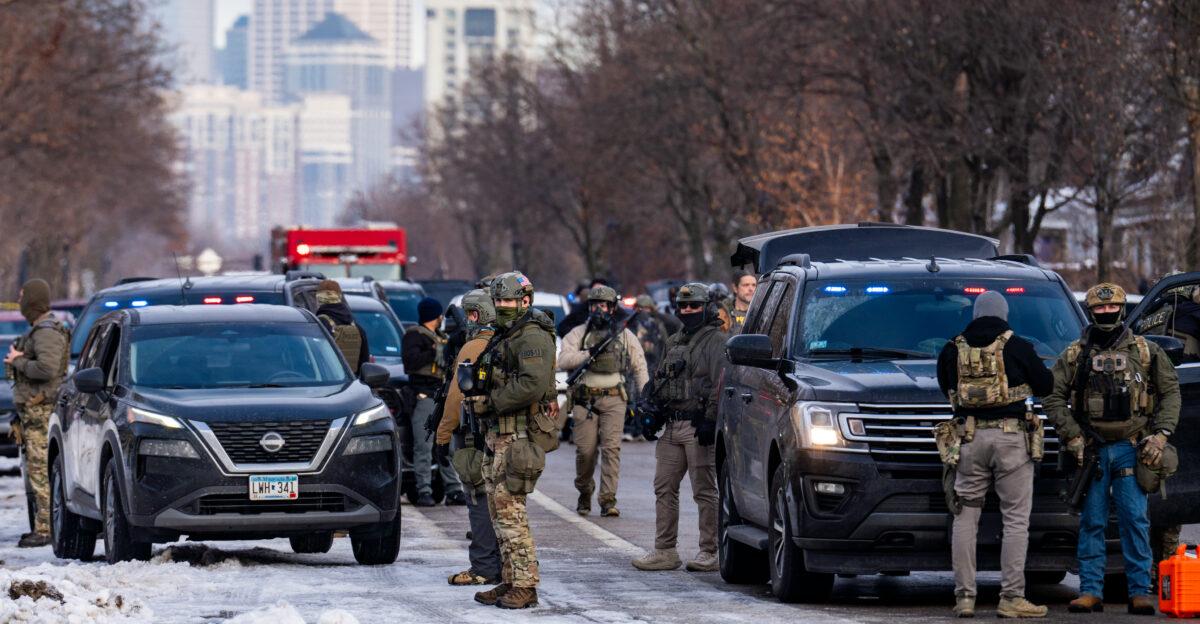 Portland Avenue and 34th Street in South Minneapolis where City of Minneapolis officials have confirmed an ICE agent shot an observer A neighbor who saw what happened told local MPR news She was trying to turn around and the ICE agent was in front of her car and he pulled out a gun and put it right in - like his midriff was on her bumper - and he reached across the hood of the car and shot her in the face like three four times CC Attribution Please credit Chad Davis with a link to chaddavis photography sets ice-in-minneapolis