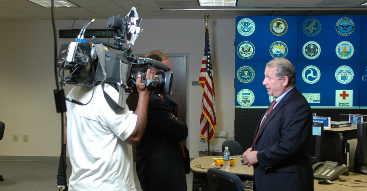 <a href="https://en.wikipedia.org/wiki/Atlanta,_Georgia" class="extiw" title="w:Atlanta, Georgia">Atlanta, GA</a>, August 20, 2007 -- <a href="https://en.wikipedia.org/wiki/Federal_Emergency_Management_Agency" class="extiw" title="en:Federal Emergency Management Agency">FEMA</a> Region IV Administrator Phil May (right) is interviewed by <a href="https://en.wikipedia.org/wiki/CBS_News" class="extiw" title="en:CBS News">CBS</a> Correspondent Mark Strassman at the Regional Response Coordination Center. Mr. Strassman was asking about the readiness of FEMA to respond to major disasters. Mark Wolfe/FEMA