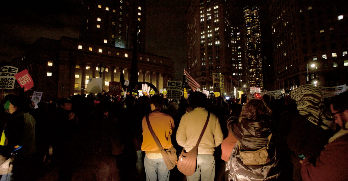 Protesters at Foley Square by the federal government building protesting the ICE killing of Renee Good hours earlier People spoke at the monument before walking around 26 Federal Plaza and ending back at Foley Square