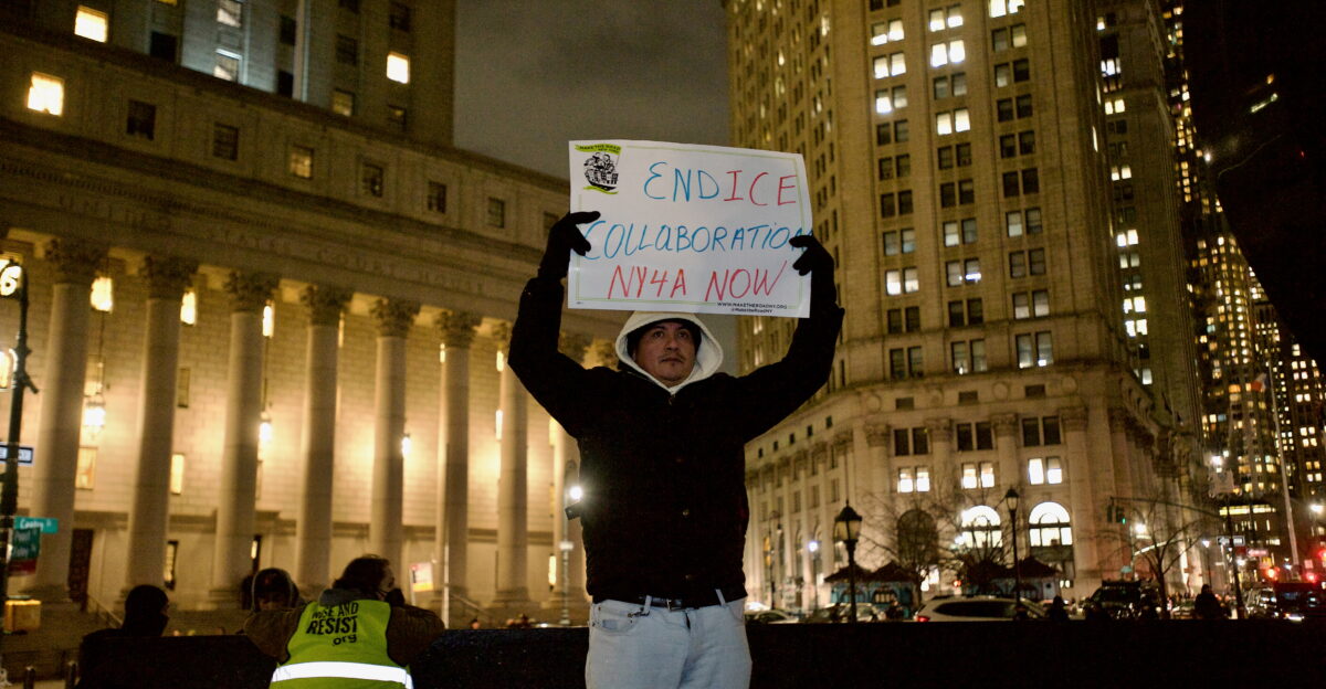 Protesters at Foley Square by the federal government building protesting the ICE killing of Renee Good hours earlier People spoke at the monument before walking around 26 Federal Plaza and ending back at Foley Square
