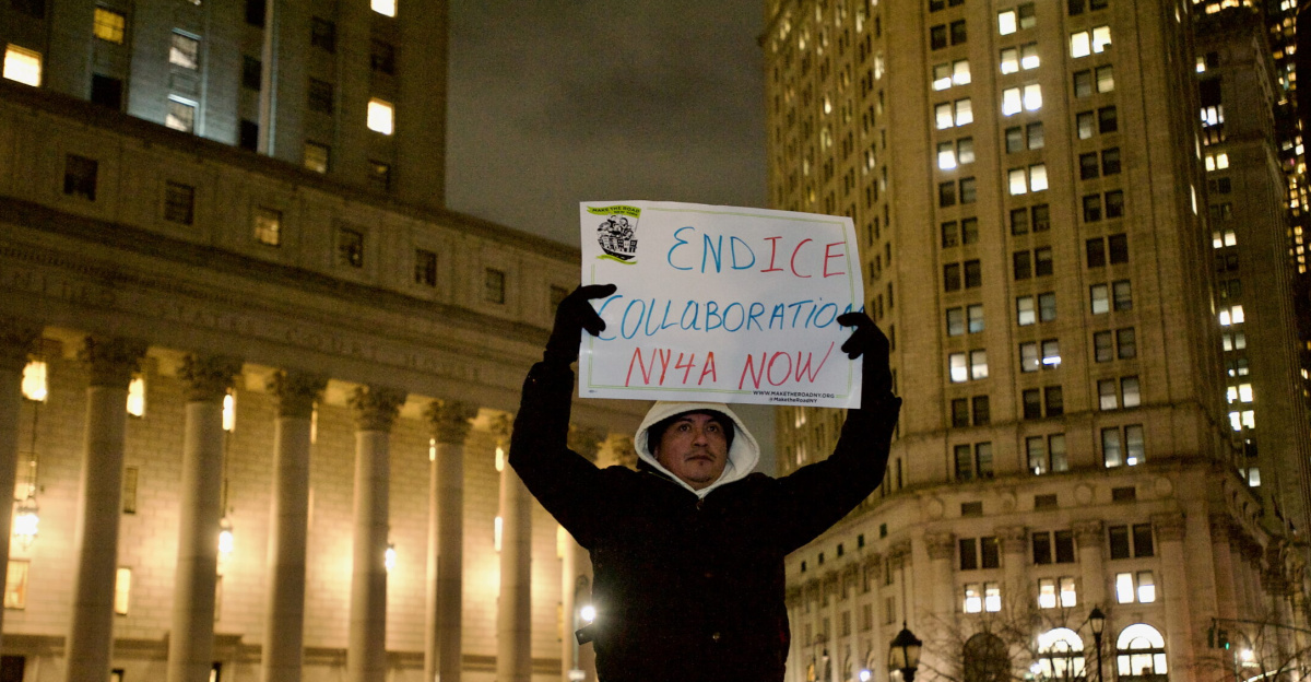 Protesters at Foley Square by the federal government building protesting the ICE killing of Renee Good hours earlier. People spoke at the monument, before walking around 26 Federal Plaza, and ending back at Foley Square.
