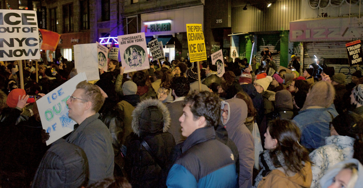 Protesters at Foley Square by the federal government building protesting the ICE killing of Renee Good hours earlier. People spoke at the monument, before walking around 26 Federal Plaza, and ending back at Foley Square.