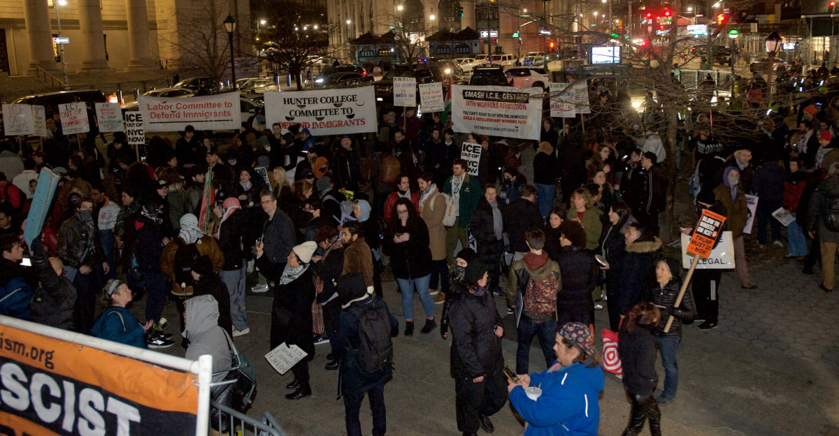 Protesters at Foley Square by the federal government building protesting the ICE killing of Renee Good hours earlier. People spoke at the monument, before walking around 26 Federal Plaza, and ending back at Foley Square.
