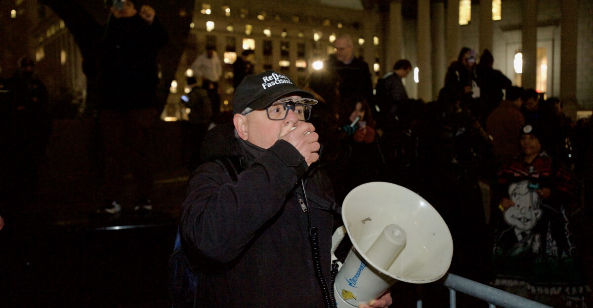 Protesters at Foley Square by the federal government building protesting the ICE killing of Renee Good hours earlier People spoke at the monument before walking around 26 Federal Plaza and ending back at Foley Square