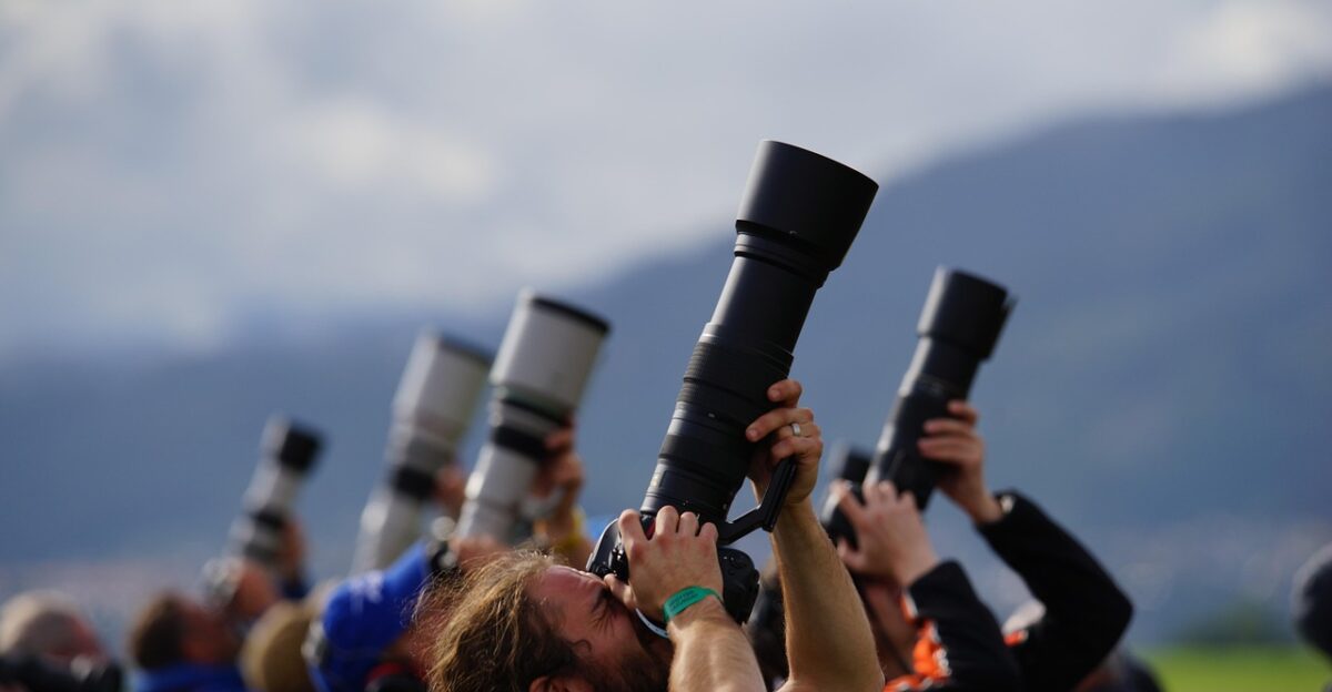 photographer photography camera taking photos spotter