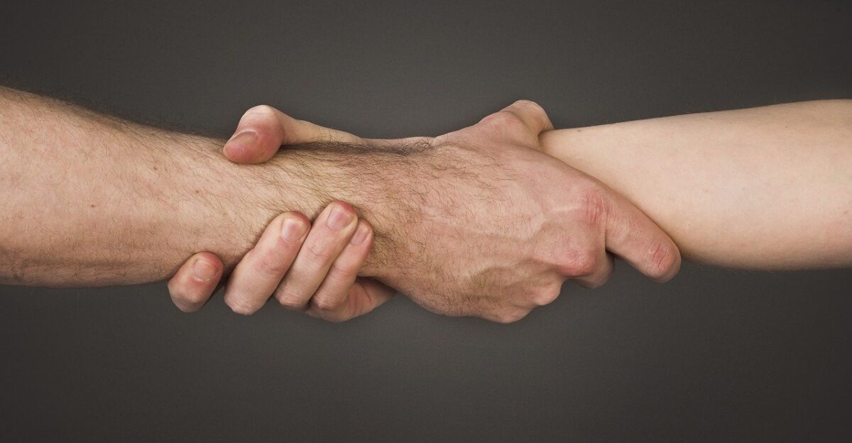 hands shake dispute draw hold tight men poor