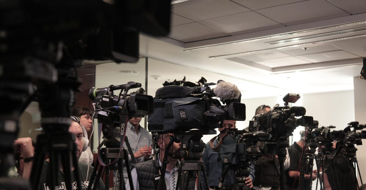 cameras filming media reporters conference video interview tripod cameramen interview interview interview interview interview