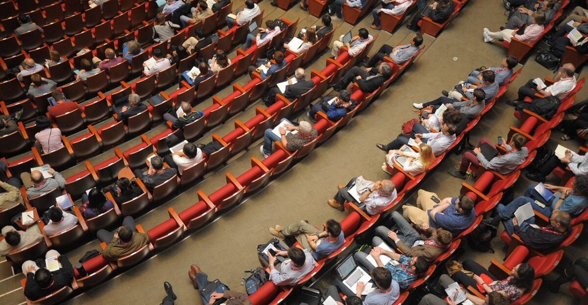 event venue auditorium meeting international conference forum conference listener audience public people sit watching meeting meeting conference conference conference conference conference audience