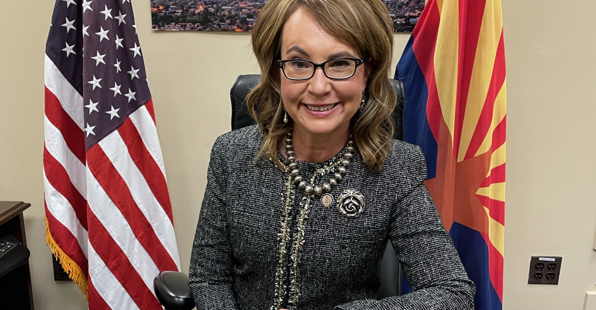 Stopped by the office on our way to the Inauguration and GabbyGiffords test drove my desk which once belonged to Senators McCain and Goldwater What do you know - she looks pretty good sitting behind it